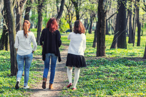 Three women walking away